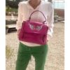 sac cuir rose ailes, porté anse