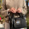 petit sac toile oeil porté